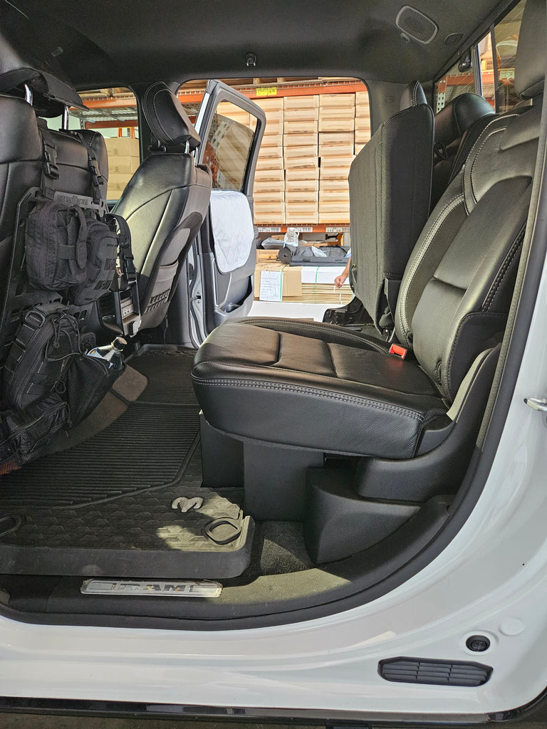 A 2019-2024 RAM 1500 TRX showing the installed lockable storage with seats down