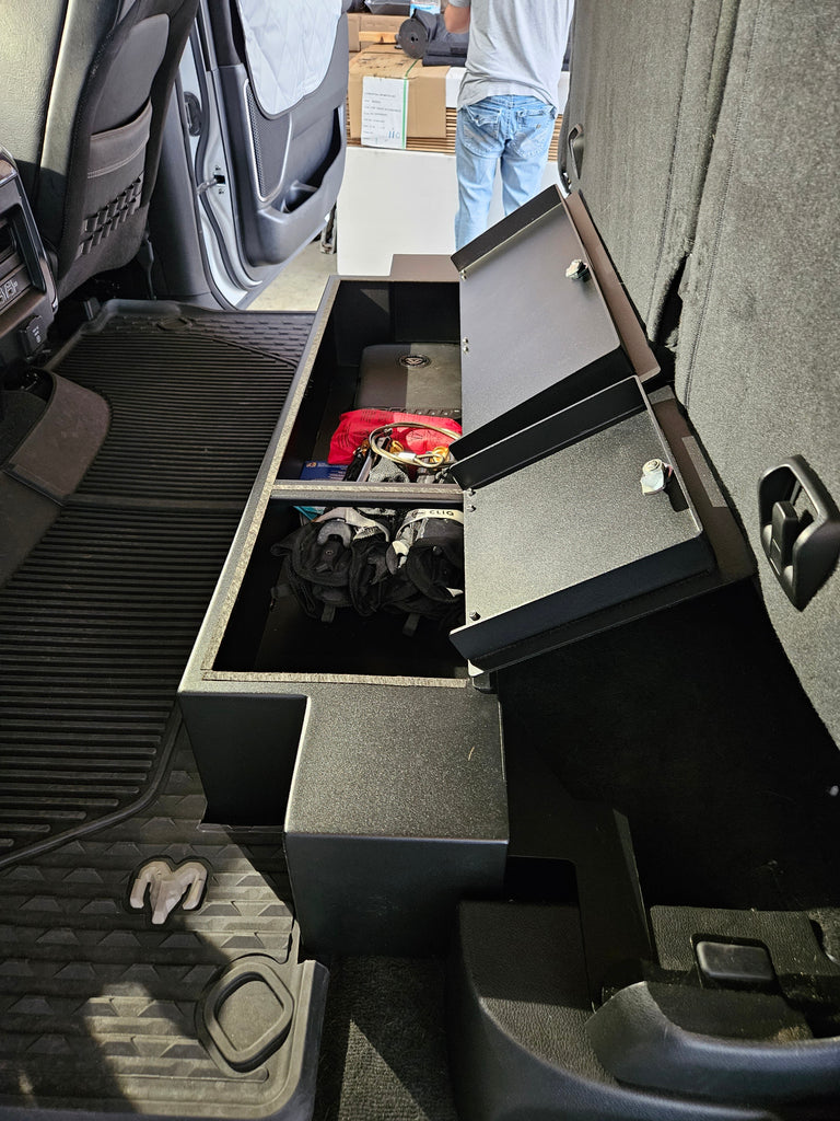 2019-2024 RAM 1500 TRX showing the installed lockable storage box with covers open an contents in the box