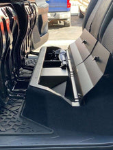 Load image into Gallery viewer, Interior shot of a Toyota Tacoma showcasing the spacious lockable storage unit under the rear seat