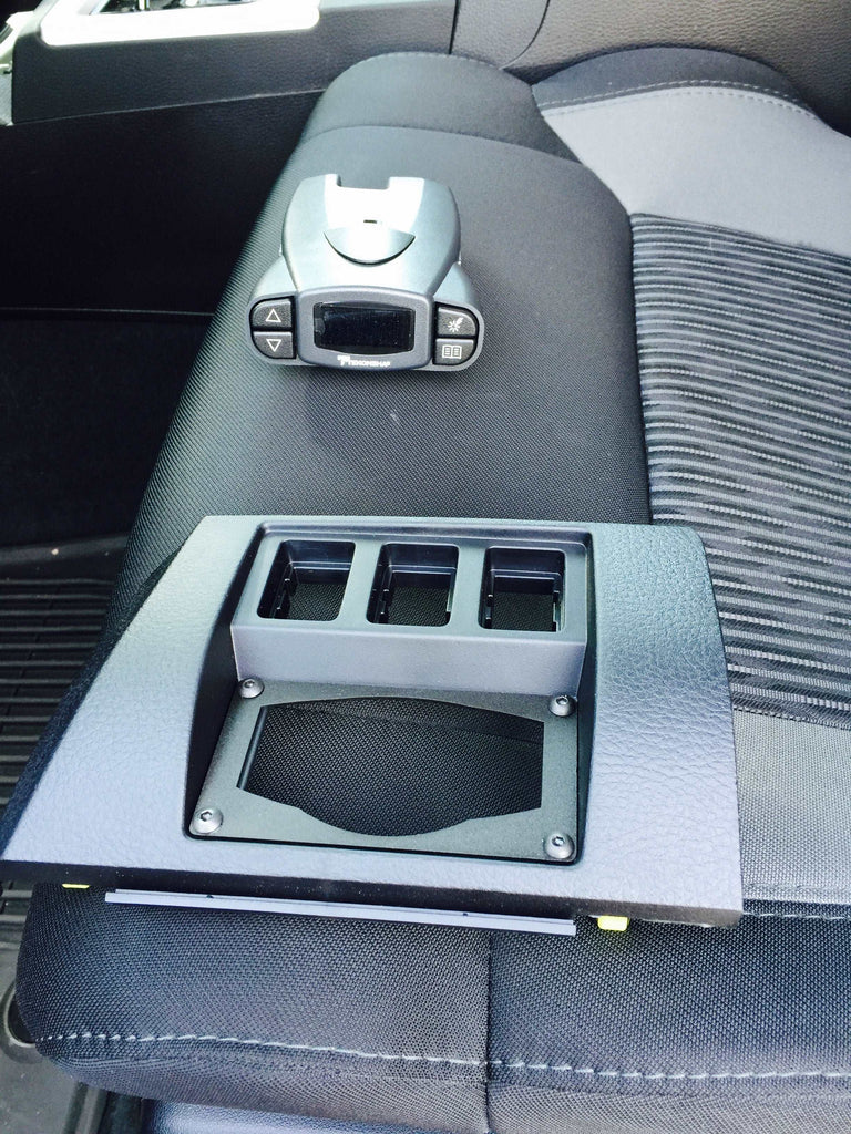 P3 Brake Controller mounting hardware on the center console of a Toyota Tundra