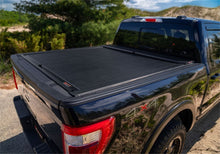 Load image into Gallery viewer, Roll-N-Lock Chevy Silverado/Sierra SB 77-3/4in M-Series Retractable Tonneau Cover