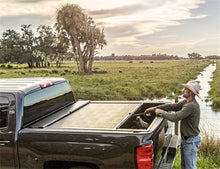 Load image into Gallery viewer, Roll-N-Lock Chevy Silverado / GMC Sierra 2500-3500 80-1/2in M-Series Retractable Tonneau Cover